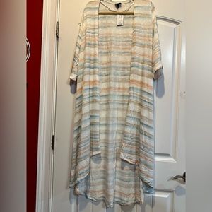 NWT. Torrid brand. Long cardigan. Size large.